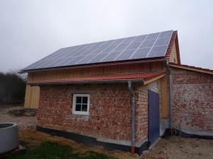 GYhouse co 3 The panels in place and feeding electricity into the grid - even on a miserable November day, at 48N - further north than Seattle or Quebec